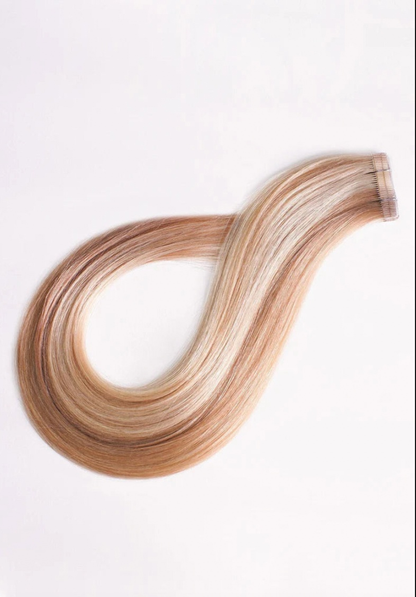 Light blond tape extensions