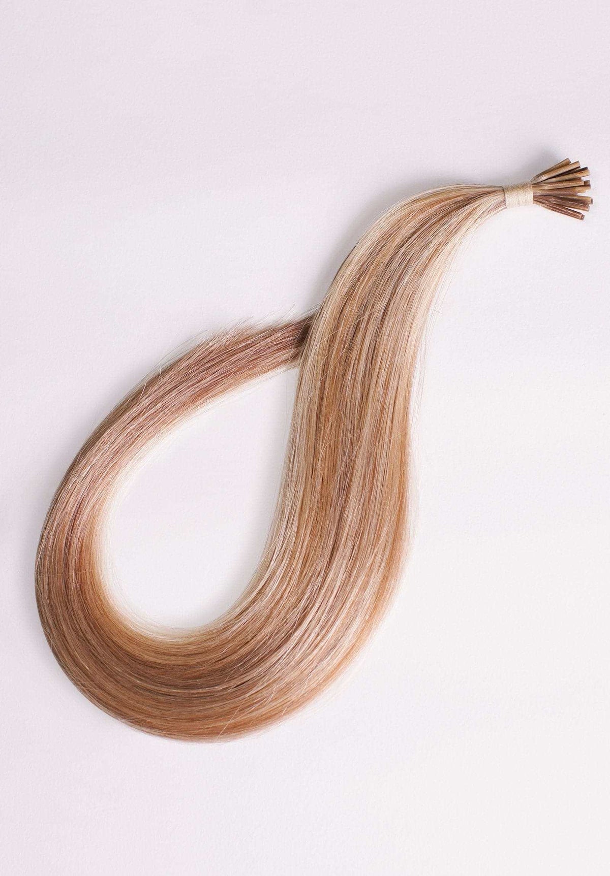 Light blond strawberry I-Tip extensions